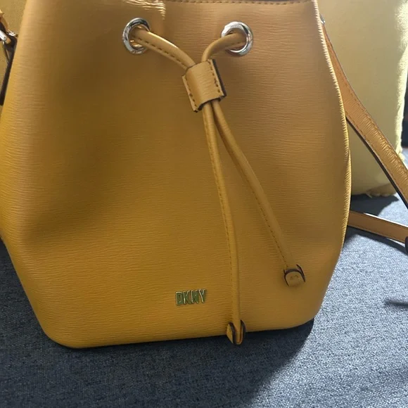 Mustard color DKNY mini hand bag. Gently used (2x)send me an offer please!! - Picture 4 of 8